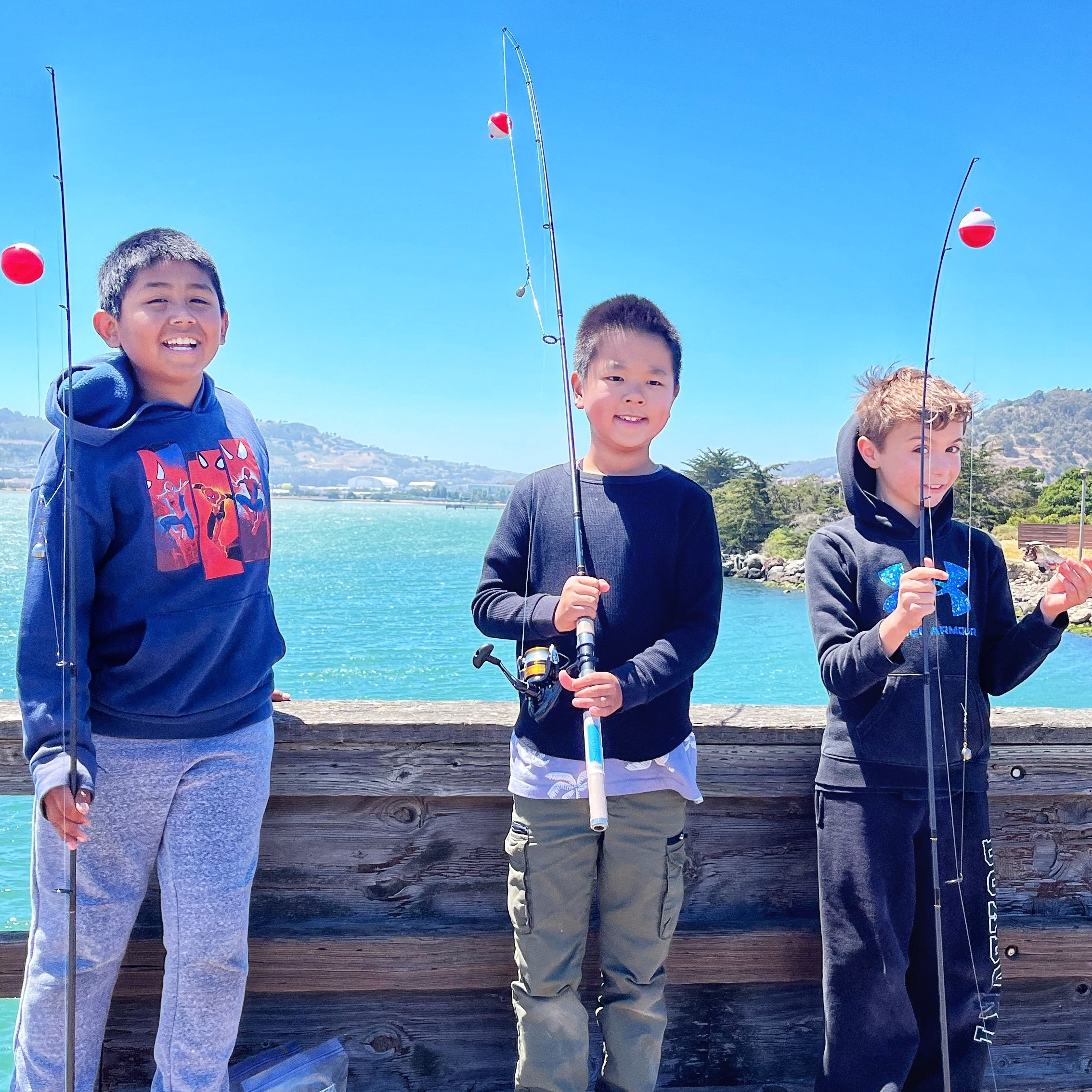 boys with fishing poles